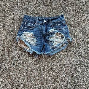 American Eagle Jean shorts with lace pockets.